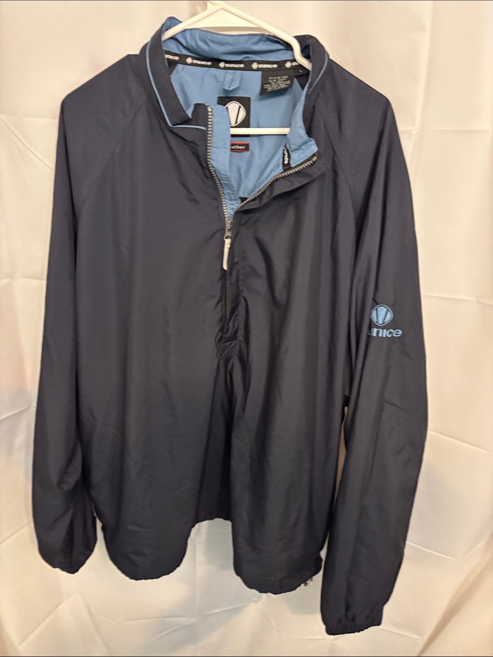 Sunice Navy Windbreaker with Light Blue Lining